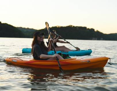 two kayakers on the water