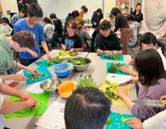 Students cutting vegetables