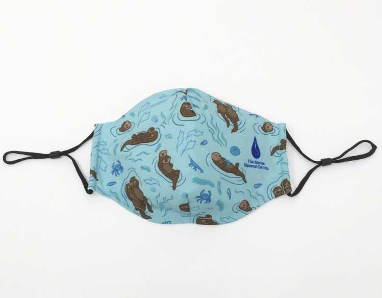 light blue face mask with sea otter design