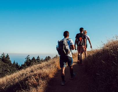 a group of young people hiking