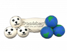 dryer balls shaped like seal heads and Earths