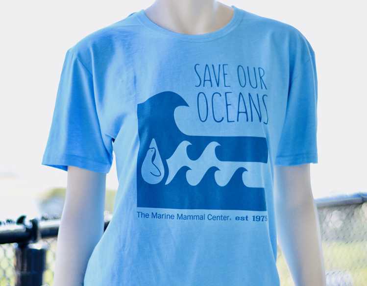 blue t-shirt that says Save Our Oceans in blue with a wave pattern