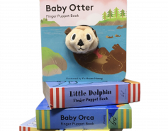 stack of finger puppet books with baby otter on top